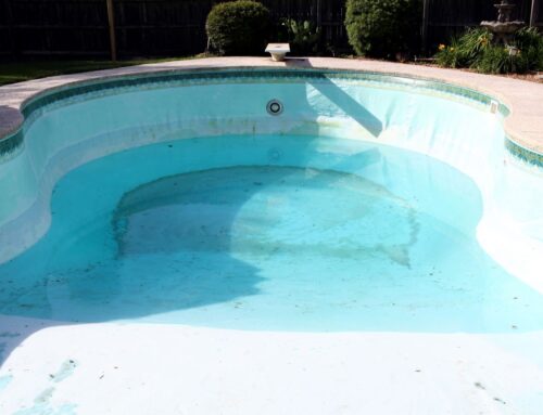 Does Your Backyard Need a Swimming Pool Restoration?